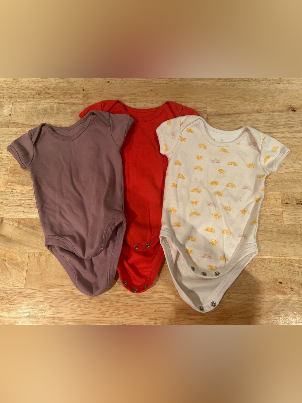 3 Pact onesies, 0-3 months